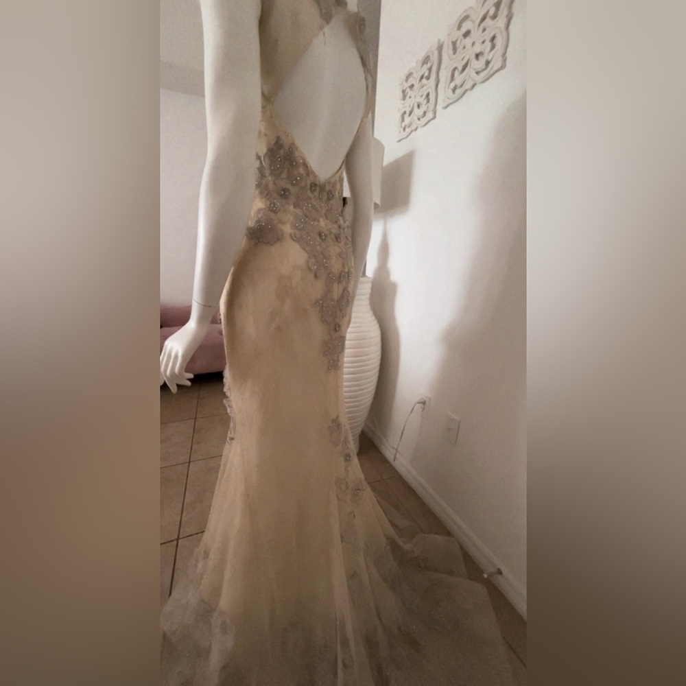 Elegant Cream Wedding Dress with Gold Embellishments - Picture 2 of 4